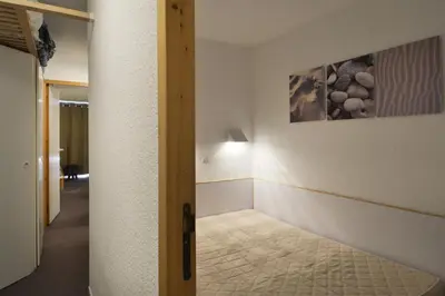 Un ou plusieurs lits dans un hébergement de l'établissement Résidence Themis - Appartement agréable et confortable · Accès direct aux pistes · Vue pistes · Casier à skis MAE-3604