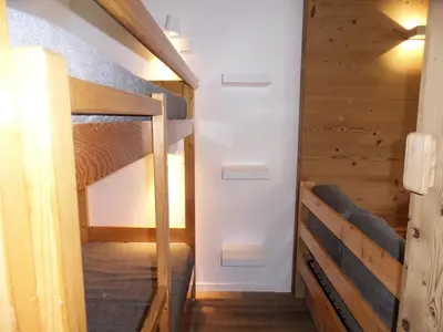 Un ou plusieurs lits superposés dans un hébergement de l'établissement Résidence Aigue-marine - Studio tout confort · Skis aux pieds · Balcon · Vue vallée MAE-3614