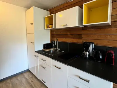 Cuisine ou kitchenette dans l'établissement Résidence Carene - Appartement chaleureux · Proche des pistes · Vue pistes · Balcon MAE-3623