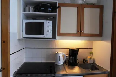 Cuisine ou kitchenette dans l'établissement Résidence Croix Du Sud - Studio tout confort · Centre station · Vue pistes · Casier à skis MAE-3627