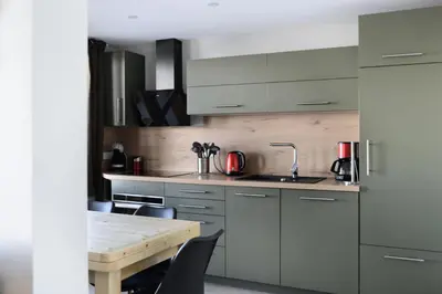 Cuisine ou kitchenette dans l'établissement Résidence Andromede - Magnifique appartement rénové · Accès direct aux pistes · Vue pistes MAE-3636