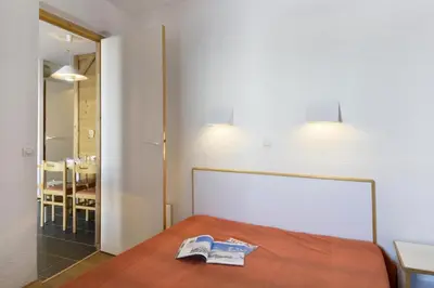 Un ou plusieurs lits dans un hébergement de l'établissement Résidence Themis - Appartement lumineux et fonctionnel· Accès direct aux pistes · Vue pistes MAE-3665