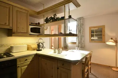 Cuisine ou kitchenette dans l'établissement Résidence Corail - Appartement tout confort spacieux · Centre station · Vue vallée MAE-3674