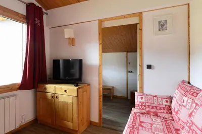 Télévision ou salle de divertissement dans l'établissement Résidence Aigue-marine - Appartement chaleureux · Accès direct aux pistes · Vue pistes MAE-3678
