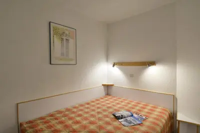 Un ou plusieurs lits dans un hébergement de l'établissement Résidence Themis - Appartement tout confort · Ski aux pieds · Vue pistes MAE-3692