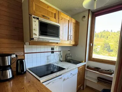 Cuisine ou kitchenette dans l'établissement Résidence Turquoise - Appartement fonctionnel · Accès direct aux pistes · Rez-de-chaussée MAE-3697