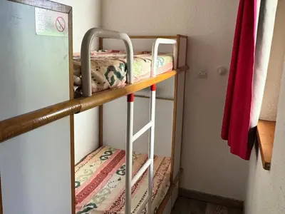 Un ou plusieurs lits superposés dans un hébergement de l'établissement Résidence Pegase - Studio fonctionnel · Pied des pistes · Vue pistes · Balcon MAE-3720