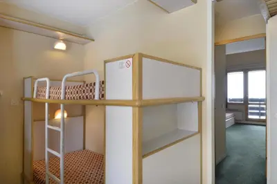 Un ou plusieurs lits superposés dans un hébergement de l'établissement Résidence Pegase - Studio confortable · Accès direct aux pistes · Vue pistes · Balcon MAE-3725