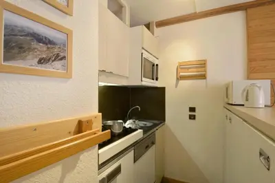Cuisine ou kitchenette dans l'établissement Résidence Comete - Appartement fonctionnel · Cœur de station · Balcon vue pistes MAE-3763