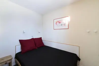 Un ou plusieurs lits dans un hébergement de l'établissement Résidence Callisto - Appartement agréable ·Accès direct aux pistes · Vue Pistes MAE-3772