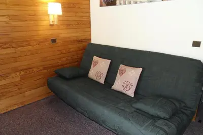 Coin salon dans l'établissement Résidence Amethyste - Studio divisible chaleureux · Accès direct aux pistes · Vue pistes MAE-3793