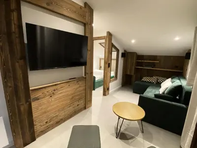 Coin salon dans l'établissement Résidence Aigue-marine - Appartement tout confort · Skis aux pieds · Vue vallée MAE-3794