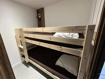 Un ou plusieurs lits dans un hébergement de l'établissement Résidence Aigue-marine - Appartement tout confort · Skis aux pieds · Vue vallée MAE-3794