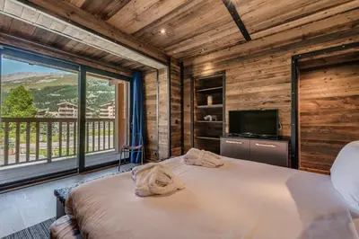 Un ou plusieurs lits dans un hébergement de l'établissement Chalet Monts by Les Etincelles