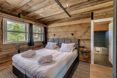 Un ou plusieurs lits dans un hébergement de l'établissement Chalet Merveilles by Les Etincelles