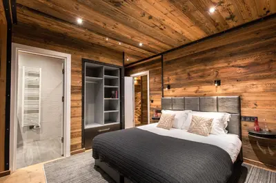 Un ou plusieurs lits dans un hébergement de l'établissement Chalet Merveilles by Les Etincelles