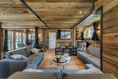 Coin salon dans l'établissement Chalet Merveilles by Les Etincelles
