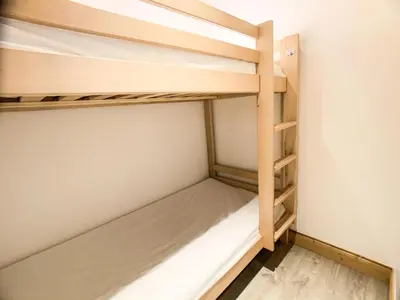 Un ou plusieurs lits dans un hébergement de l'établissement Résidence Tommeuses - Studio rénové·Pieds des pistes ·Balcon MAE-6704