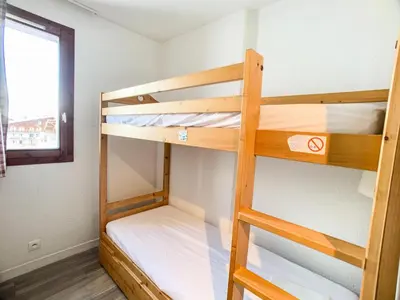Un ou plusieurs lits superposés dans un hébergement de l'établissement Résidence Rond Point Des Pistes A - Appartement proche des pistes·Balcon MAE-6728