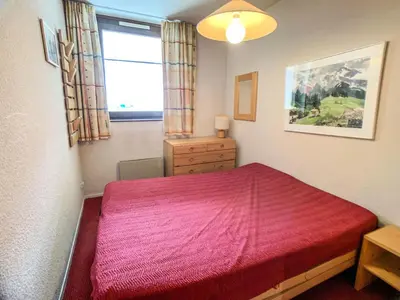 Un ou plusieurs lits dans un hébergement de l'établissement Résidence Tommeuses - Appartement confortable·Pieds des pistes·Balcon MAE-6733