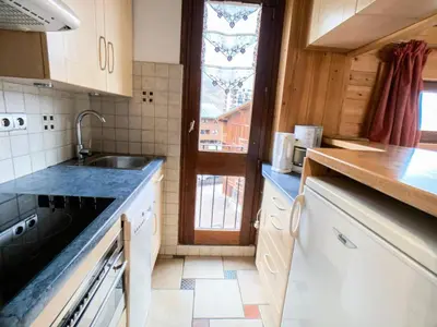 Cuisine ou kitchenette dans l'établissement Résidence Grand Tichot A - Appartement lumineux · Proche des pistes MAE-6737