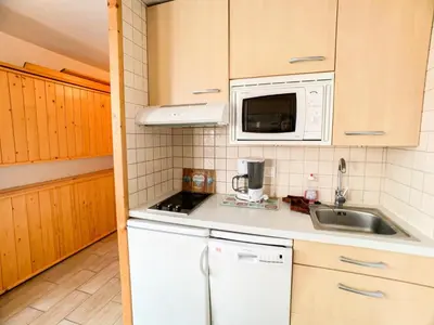 Cuisine ou kitchenette dans l'établissement Résidence Platieres - Studio au centre du Val Claret haut MAE-6750