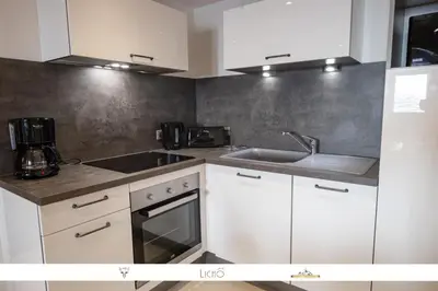Cuisine ou kitchenette dans l'établissement MARMOTTE 101 - Appartement pour 6, aux pieds des pistes
