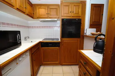 Cuisine ou kitchenette dans l'établissement Les Chalets du Bouquetin - Martre