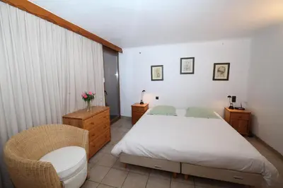 Un ou plusieurs lits dans un hébergement de l'établissement Les Chalets du Bouquetin - Martre