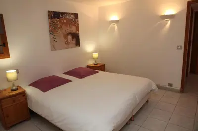 Un ou plusieurs lits dans un hébergement de l'établissement Les Chalets du Bouquetin - Loir