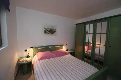 Un ou plusieurs lits dans un hébergement de l'établissement Les Chalets du Bouquetin - Mouflon