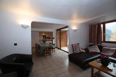 Coin salon dans l'établissement Les Chalets du Bouquetin - Mouflon