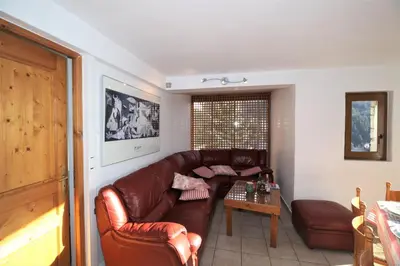 Coin salon dans l'établissement Les Chalets du Bouquetin - Ecureuil