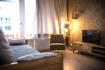 Télévision ou salle de divertissement dans l'établissement Le Rosset