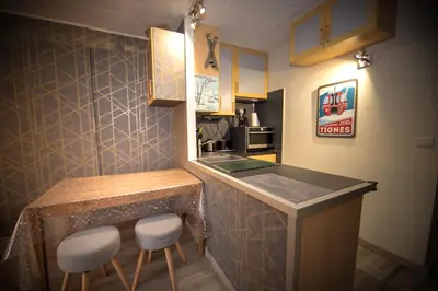 Cuisine ou kitchenette dans l'établissement Le Rosset