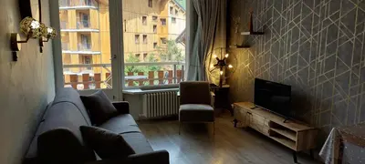 Coin salon dans l'établissement Le Rosset