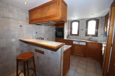 Cuisine ou kitchenette dans l'établissement Les Chalets du Bouquetin - Blaireau