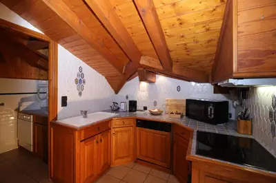 Cuisine ou kitchenette dans l'établissement Les Chalets du Bouquetin - Blaireau