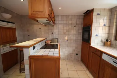Cuisine ou kitchenette dans l'établissement Les Chalets du Bouquetin - Blaireau