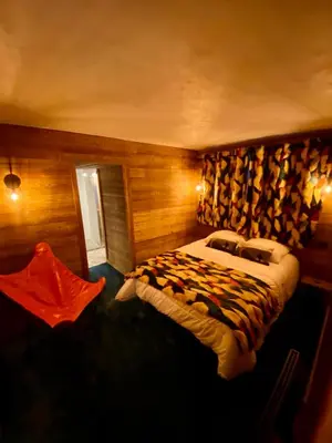 Un ou plusieurs lits dans un hébergement de l'établissement chalet la grange