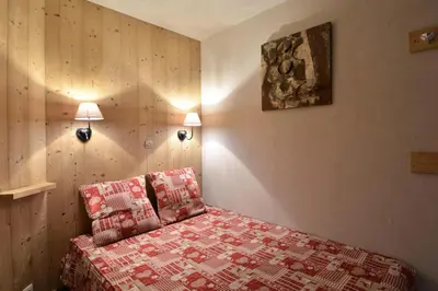 Un ou plusieurs lits dans un hébergement de l'établissement Résidence Andromede - Appartement tout confort · Au pied des pistes · Vue pistes · Casier à skis MAE-3586