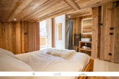 Un ou plusieurs lits dans un hébergement de l'établissement Marmotte 205 - Splendide duplex aux pieds des pistes