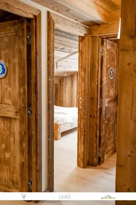Un ou plusieurs lits dans un hébergement de l'établissement Marmotte 205 - Splendide duplex aux pieds des pistes