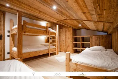 Un ou plusieurs lits dans un hébergement de l'établissement Marmotte 205 - Splendide duplex aux pieds des pistes