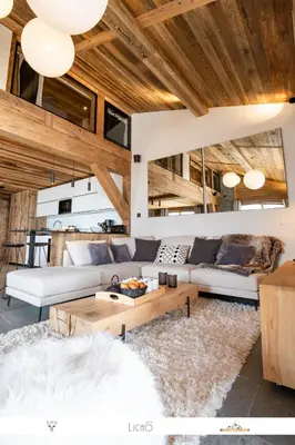 Coin salon dans l'établissement Marmotte 205 - Splendide duplex aux pieds des pistes