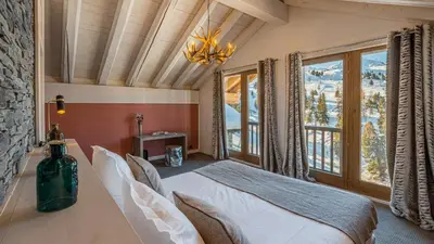 Un ou plusieurs lits dans un hébergement de l'établissement Chalet Juliette by Les Etincelles
