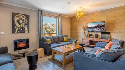 Coin salon dans l'établissement Chalet Violette by Les Etincelles