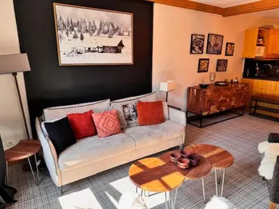 Coin salon dans l'établissement Appartement Standing 5* Arc 1950