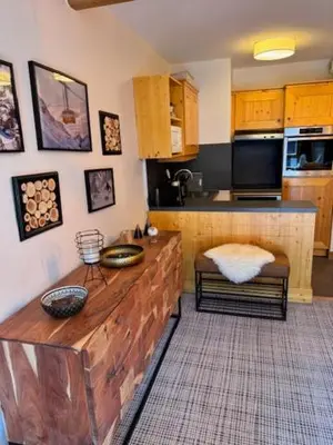 Cuisine ou kitchenette dans l'établissement Appartement Standing 5* Arc 1950
