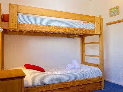 Un ou plusieurs lits dans un hébergement de l'établissement Apartment Les Tommeuses - Val Claret-24 by Interhome